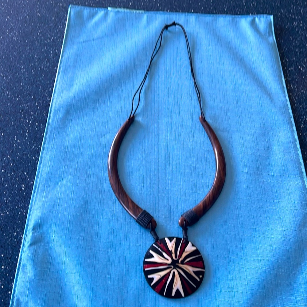 Vintage tribal look lg. resin & wood medallion pendant necklace with black cord
